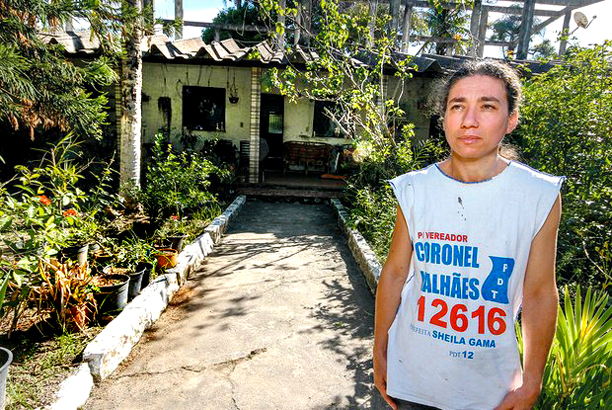 Cristina Batista Malhaes wearing a t-shirt for her dead husband's campaign for public office